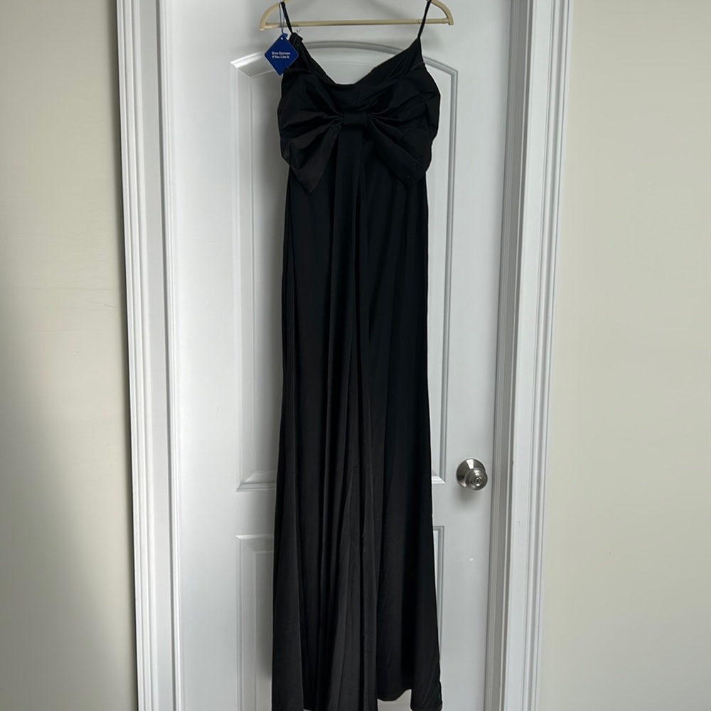 Black strapless evening gown with oversized bow on back